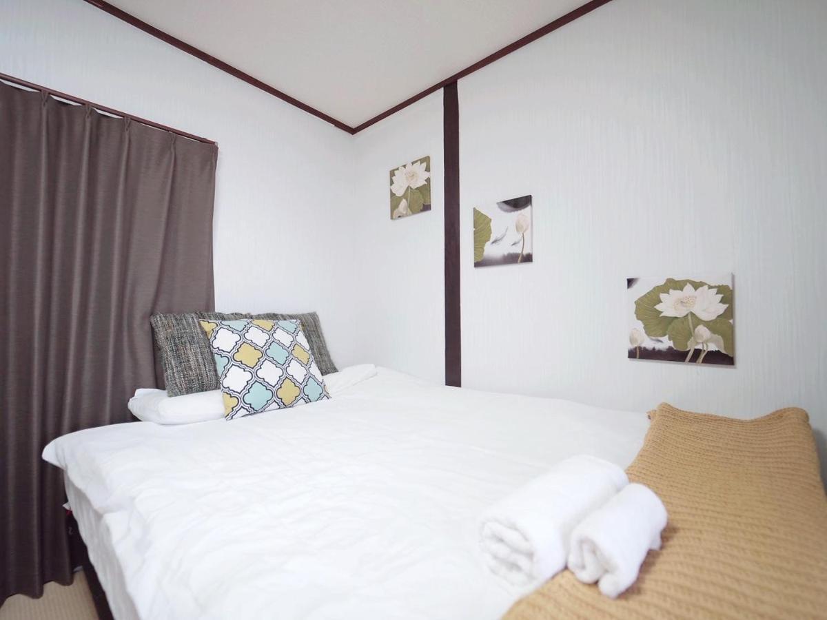Nippori Osaka Nishi-Tengachaya Guesthouse西天下茶屋アパートメント Екстер'єр фото