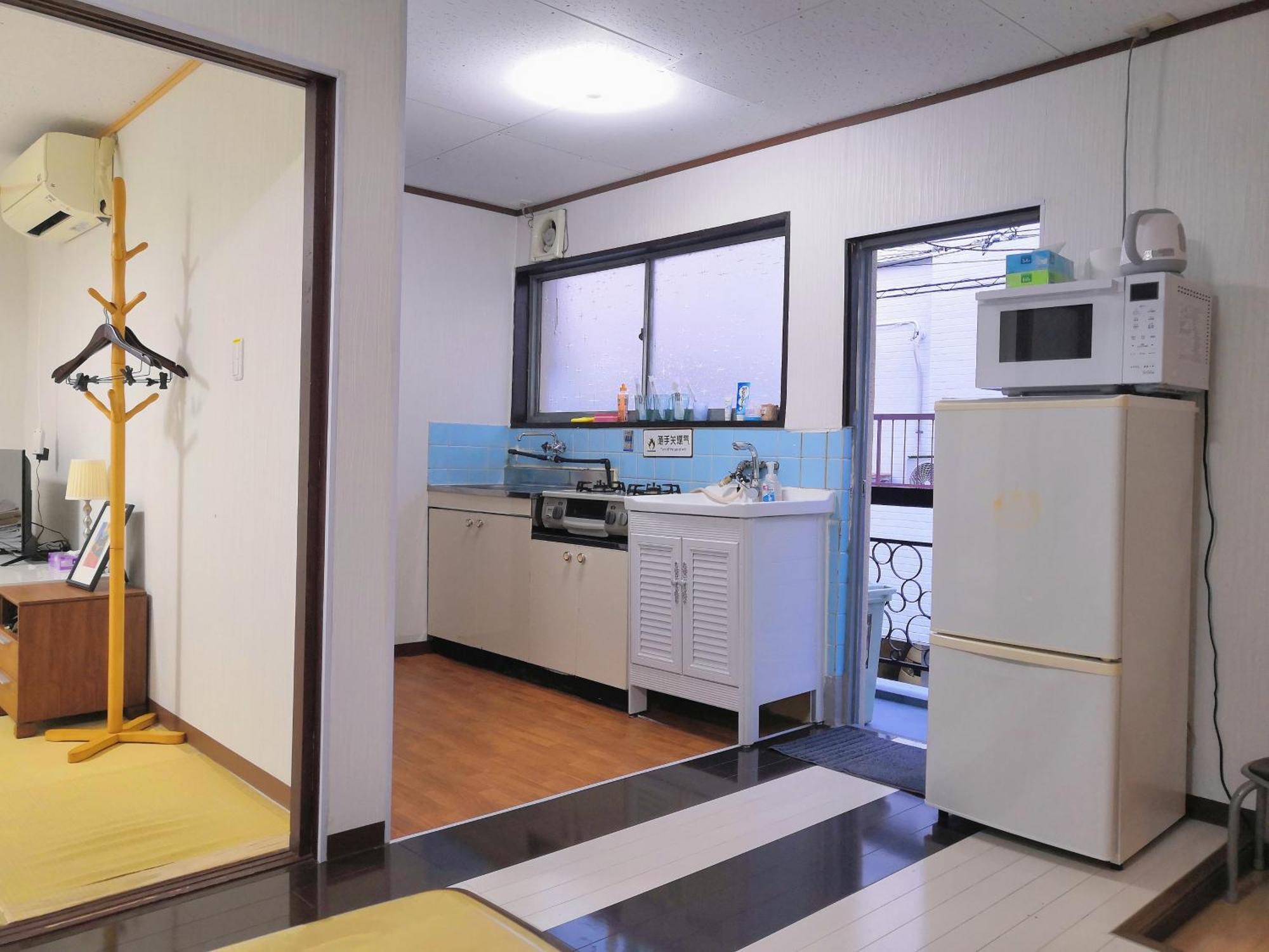 Nippori Osaka Nishi-Tengachaya Guesthouse西天下茶屋アパートメント Екстер'єр фото