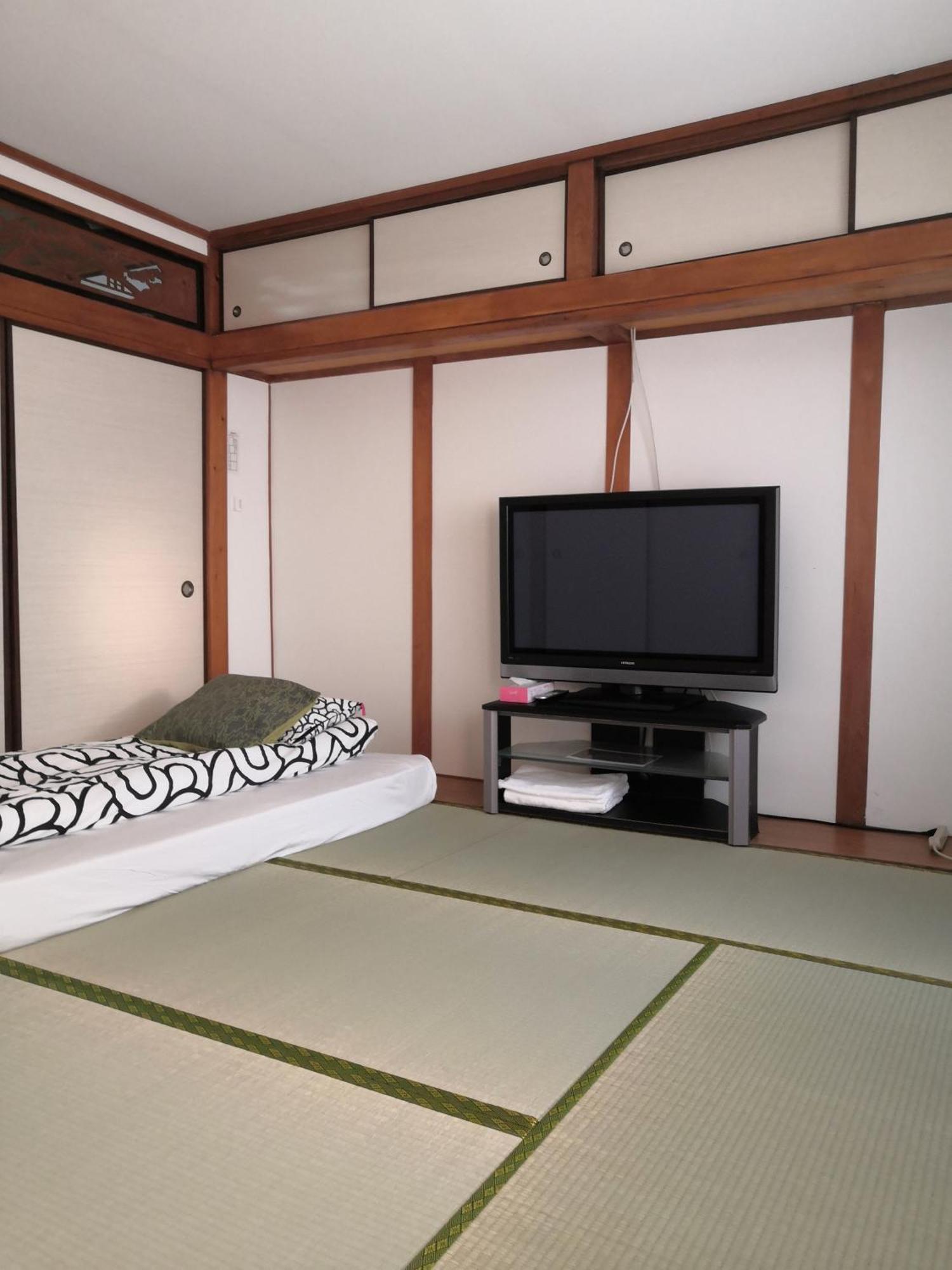 Nippori Osaka Nishi-Tengachaya Guesthouse西天下茶屋アパートメント Екстер'єр фото
