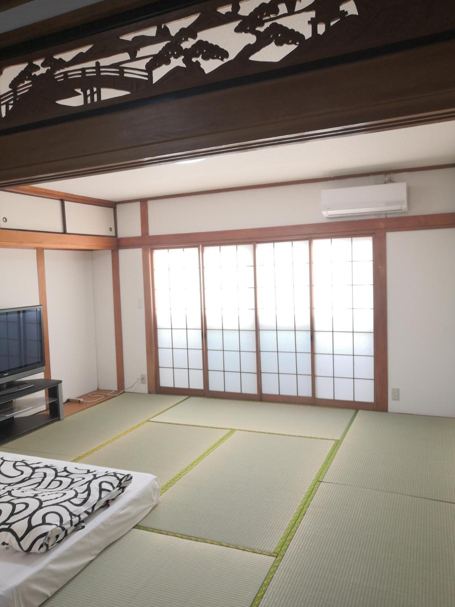 Nippori Osaka Nishi-Tengachaya Guesthouse西天下茶屋アパートメント Екстер'єр фото
