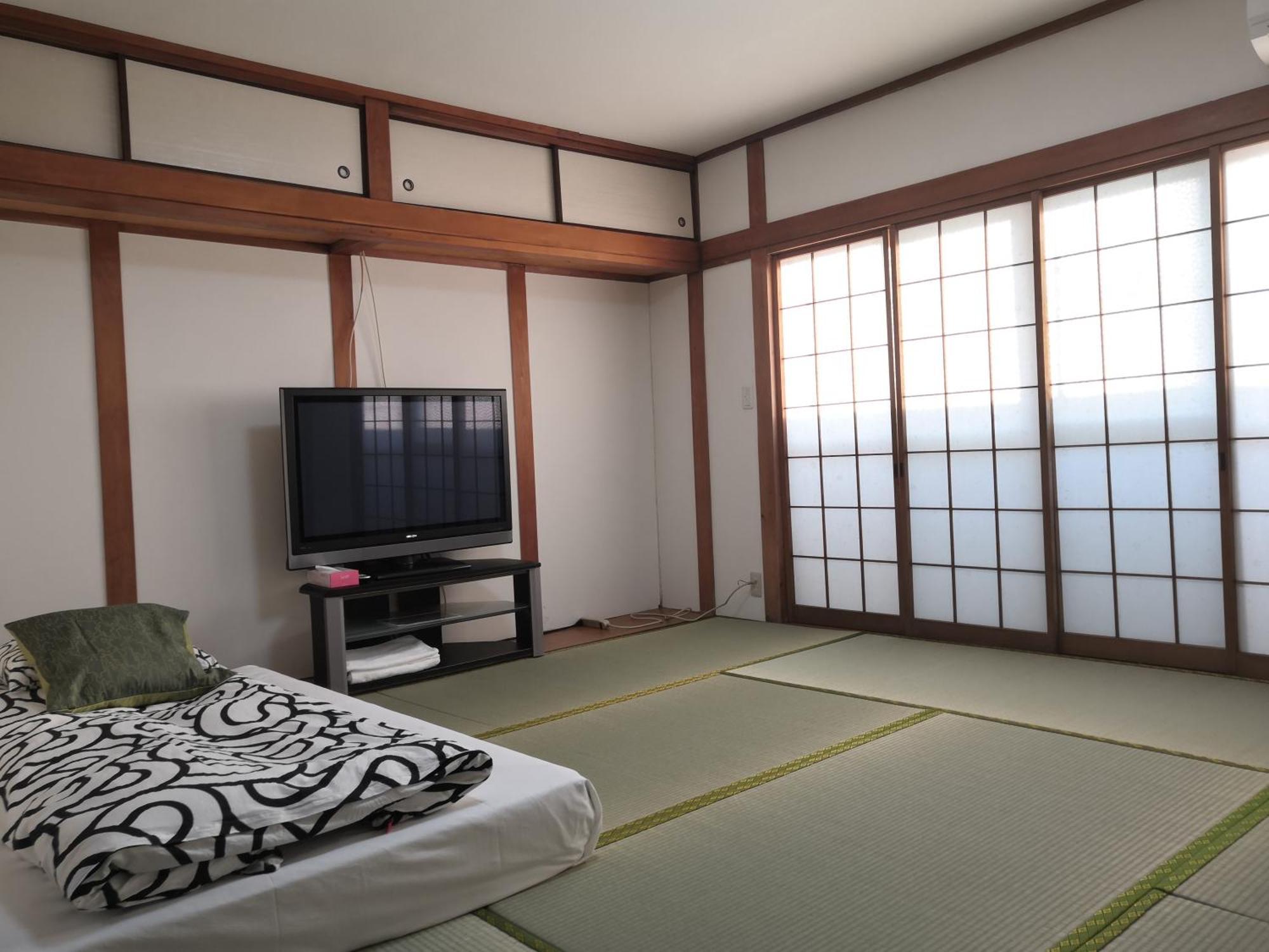 Nippori Osaka Nishi-Tengachaya Guesthouse西天下茶屋アパートメント Екстер'єр фото